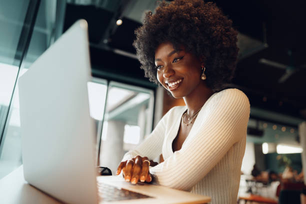 Woman using laptop at work