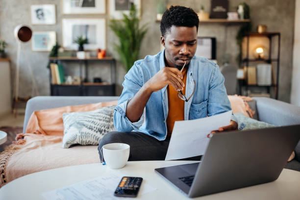 Young Man using Laptop